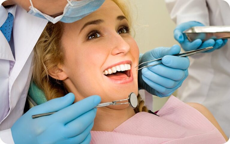 a dentist is doing dental treatment